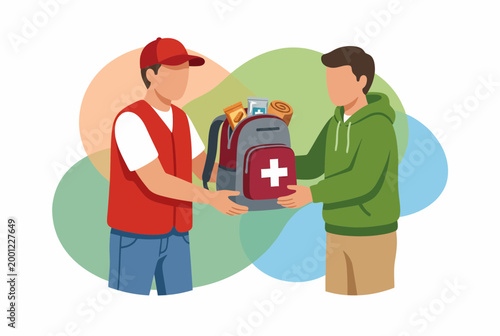 Aid worker giving emergency supply backpack to a person