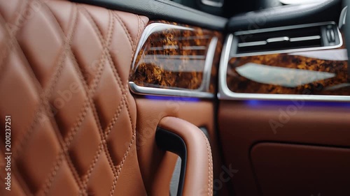 Luxury Car Interior Brown Quilted Leather Wood Trim and Ambient Lighting