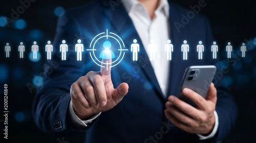 Corporate manager using smartphone and touching digital target icon with human figures representing customer acquisition and audience segmentation for targeted marketing campaigns