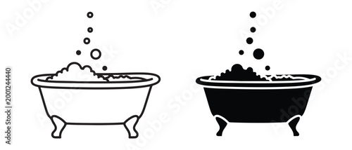 Two stylized bathtubs filled with foam and bubbles isolated on white