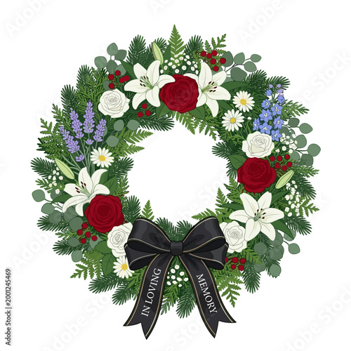 Memorial wreath with lilies, roses and black bow