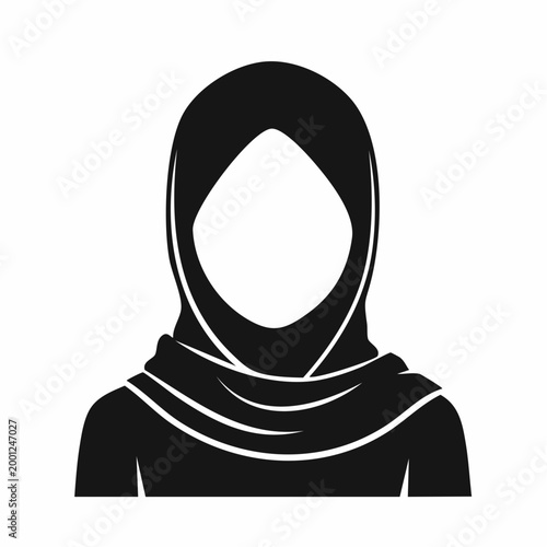 Silhouette of a woman wearing a hijab