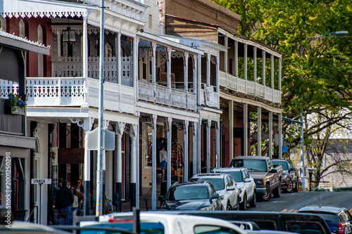 Historic Gold Rush era Main Street with balconied buildings in Sutter Creek, California