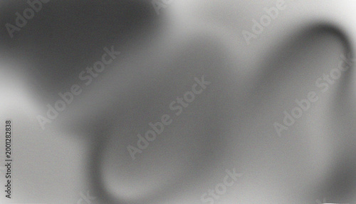 A soft, minimalist abstract background featuring smooth grey and white gradients with a subtle film grain texture for a modern look.