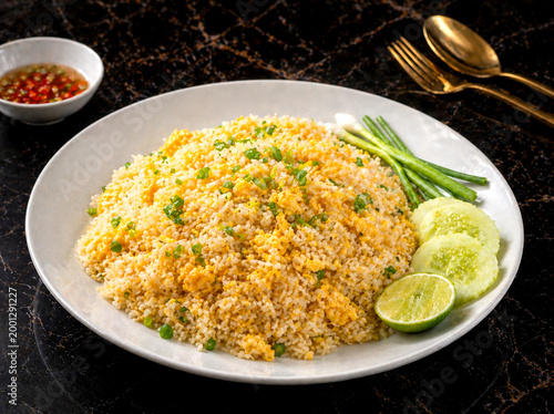 Luxury Thai Egg Fried Rice Angle View Golden Fried Rice with Scrambled Eggs, Gourmet Asian Cuisine, Elegant Plating, Professional 4K Food Photography