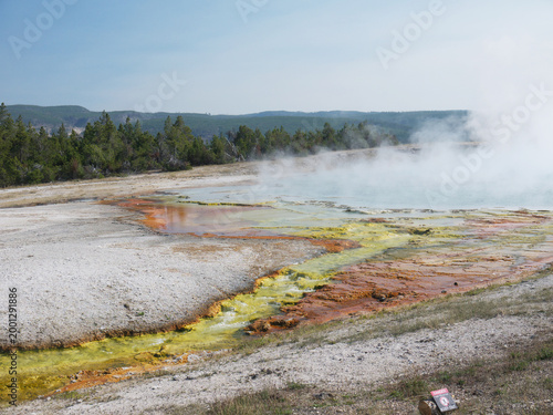 Excelsior Geyser Runoff with colorful mineral deposits in volcanic landscape, Yellowstone National park