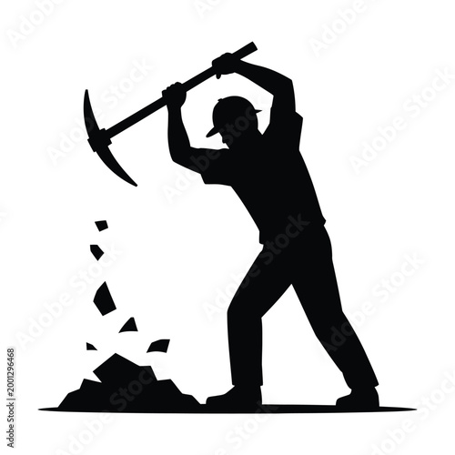 Miner working with pickaxe breaking rocks digging ground industrial mining labor.