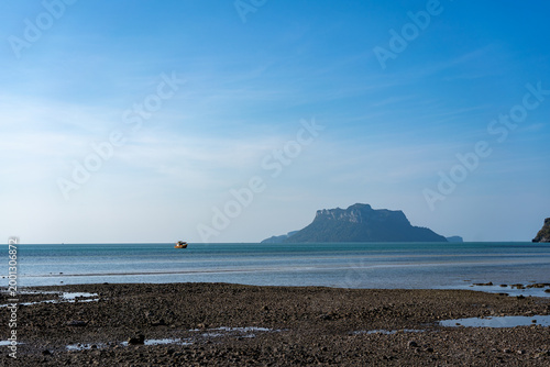 Boat and Karst Island at Low Tide, Koh Phaluai, Thailand