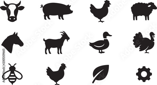 Black silhouettes of various animals and insects including deer elk bat owl bird rabbit and butterfly