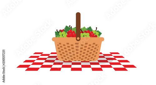 A rustic woven wooden basket overflowing with fresh clusters of red and green grapes rests on a classic red and white checkered tablecloth against a white background.