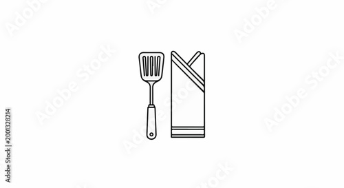 A cooking utensil and a folded napkin on a white background
