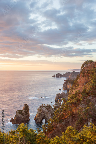 Panoramic view over Kitayamazaki cliffs and natural rock arches, Sanriku Coast, Tanohata, Iwate, Japan.