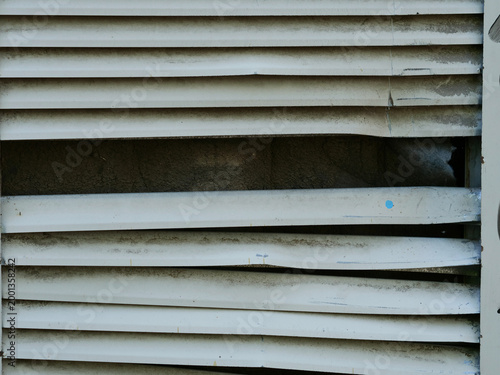 Принти на полотні broken ventilation slats caused by trucks maneuvering