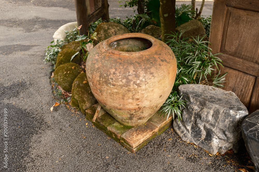 Fototapeta premium Water jars of the ancient in garden, Thailand.