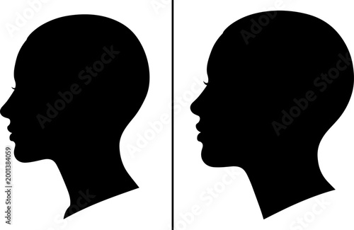 Black silhouette profiles of two human heads facing each other, emphasizing symmetry, contrast, communication, and psychological comparison in design