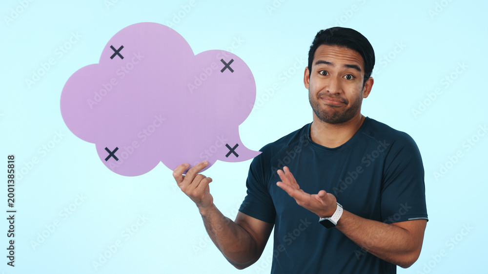 Fototapeta premium Fitness, speech bubble and portrait of man in studio for exercise, workout tips and question. Mockup, space and person with poster for gym membership, social media and announcement on blue background