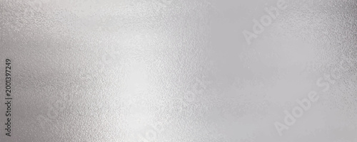 Silver metallic effect foil. Silver texture. Gradient background. Metal surface print. Glitter backdrop. Silver plate. Shine design invitation, wedding greeting, cards, prints.