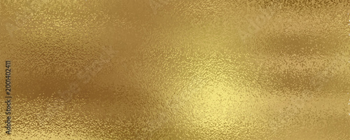 Gold metallic effect foil. Golden texture for design. Beautiful background. Abstract glitter mottled speckled structure. Shine glitterer metal effect. Gold surface. Backdrop golden metal plate. Vector