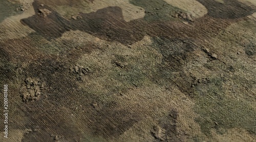 Close-up texture of camouflage fabric with rough raised elements and a worn appearance