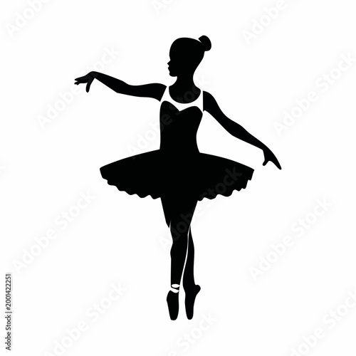 Silhouette of a Ballerina in a Tutu Performing a Ballet Pose