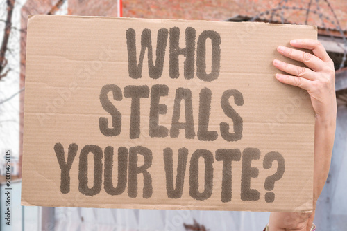 Fotografie "Who Steals Your Vote?" Documented research examines documented vote theft measurably undermining documented adult democratic participation