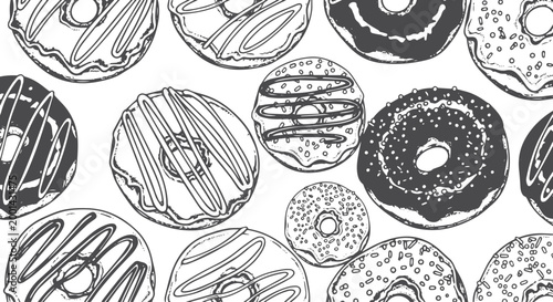Black and white donut pattern with glaze and sprinkles