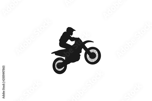 Motocross Rider Performing a Wheelie Silhouette