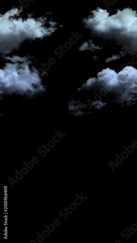 Dramatic, moody storm clouds drift across a vast, dark night sky, evoking a sense of mystery and natural power in this captivating atmospheric scene