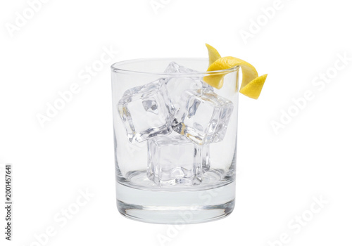 Glass of whiskey with ice cubes