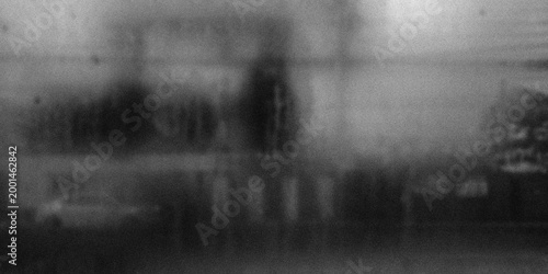 Fotografi Abstract monochrome street scene with heavy film grain and motion blur