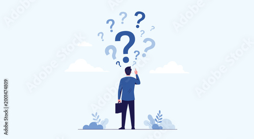 Businessman standing with his back turned while looking up at a floating cloud of blue question marks in the sky.