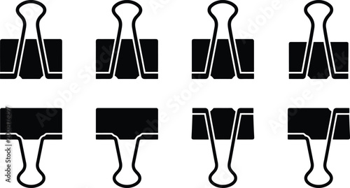 Fotografie Conjunto de cuatro clips de papel negros en dos filas, mostrando diferentes ángulos y usos para sujetar documentos