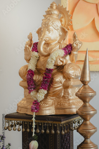Ganesh statue with flower decor 