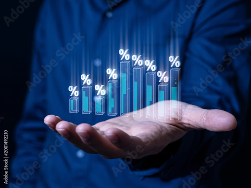 A person displaying a digital bar graph with percentage signs floating above their open hand