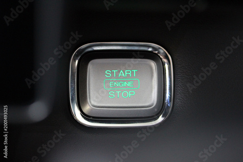 Engine start stop button in a modern luxury vehicle