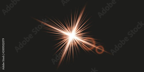 Bright orange starburst lens flare effect with circular rings on black background.