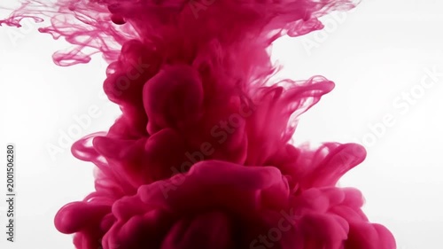 Dark Red Ink Cloud Swirling in Water Abstract Background