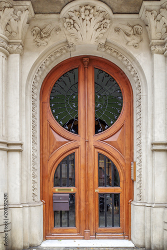 Art Nouveau Wooden Door Entrance, Ornamental Stone Carvings With Floral Motifs, Arched Gateway, Modernism Architecture
