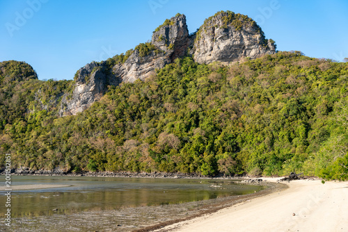 Sandy Beach and Karst Peaks Reflected in Tidal Bay, Koh Phaluai, Thailand