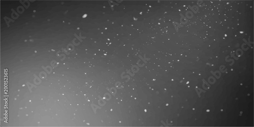 A mesmerizing display of falling rain against a gray backdrop, captured in monochrome. 