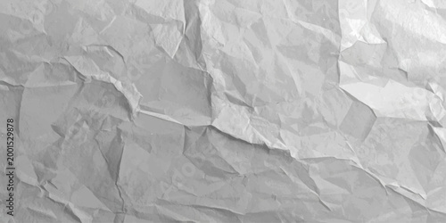 A wrinkled and creased vintage brown paper sheet with a rough crumpled texture provides a blank damaged grunge pattern for a weathered material backdrop design