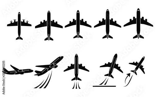 A collection of black silhouettes depicting various airplanes in different flight positions and movements on a white background