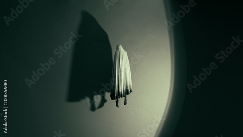 White Hooded Ghost Sheet Ghost Floating Phantom Spirit Apparition with Dramatic Shadow on Dark Wall Eerie Spooky Atmosphere 3D Illustration