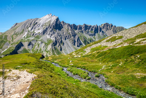 Schilderij op canvas Alpine valley and Aiguilles de la Pennaz rocky peaks at Contamines Montjoie, Fra