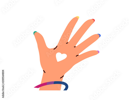 Female hand with heart symbol, love sticker on palm and rainbow colored nails...