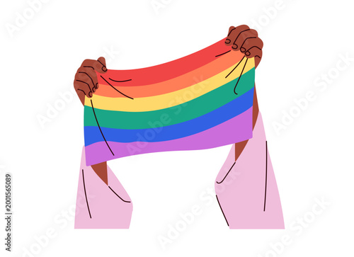 Hands holding LGBT flag, celebrating Pride Month. LGBTQ equality and rights s...