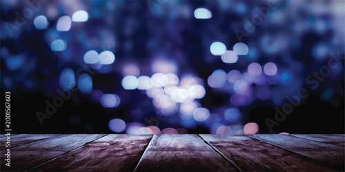 An out of focus vibrant purple and blue bokeh lights abstract background with a rustic wooden plank foreground providing a sense of depth and atmospheric mood