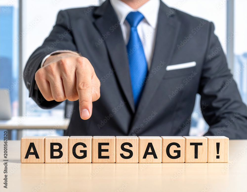 Obraz premium Abgesagt! - Geschäftsmann zeigt auf den Text 