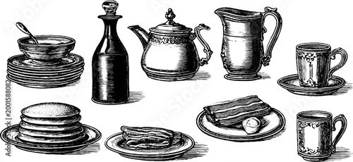 Tea pots and breakfast plates arranged on white background