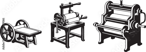 Vintage manual printing press machines featuring industrial heavy metal rollers and historical equipment for classic typography.